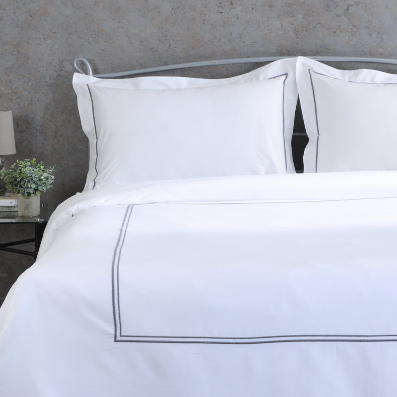 This image is a close up shot of the Ethan style duvet cover set in White. Whites of London New Zealand and Australia. 