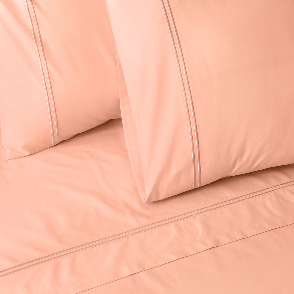 Whites of London 250TC GOTS certified Organic Cotton coloured Sheet Set Peach Nectar – white double embroidered stripe detail