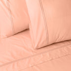 Whites of London 250TC GOTS certified Organic Cotton coloured Sheet Set Peach Nectar – white double embroidered stripe detail