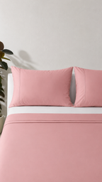 Dusty Pink Flat sheet styled with match pillowcases and fitted sheet added