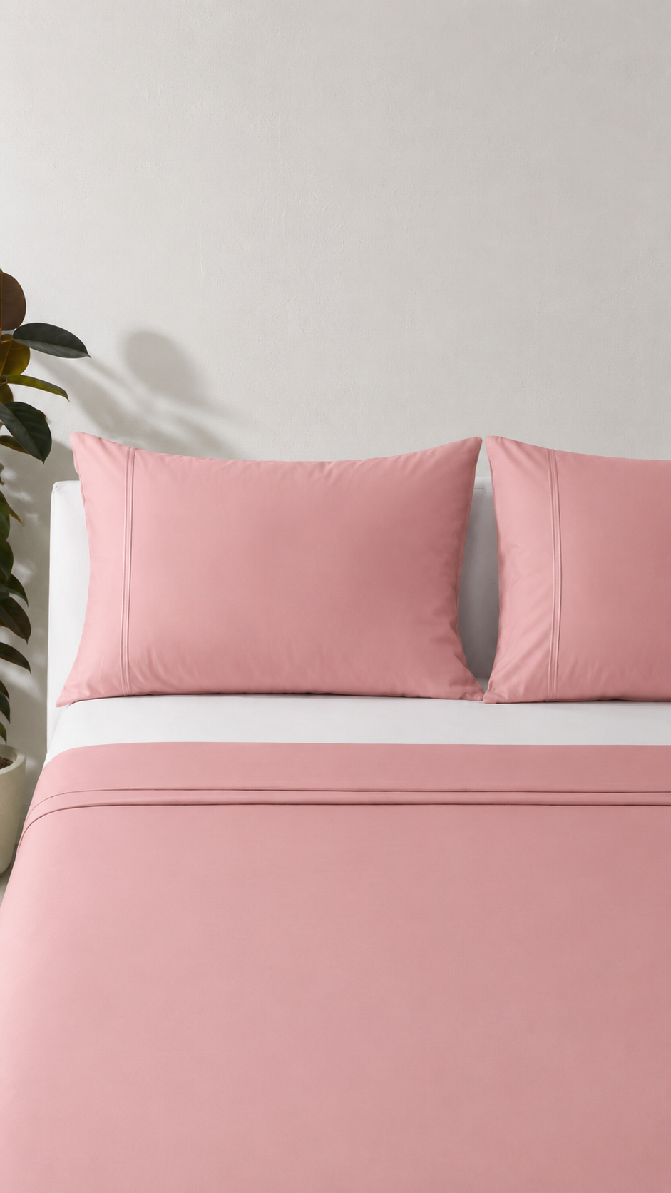 Dusty Pink Flat sheet styled with match pillowcases and fitted sheet added