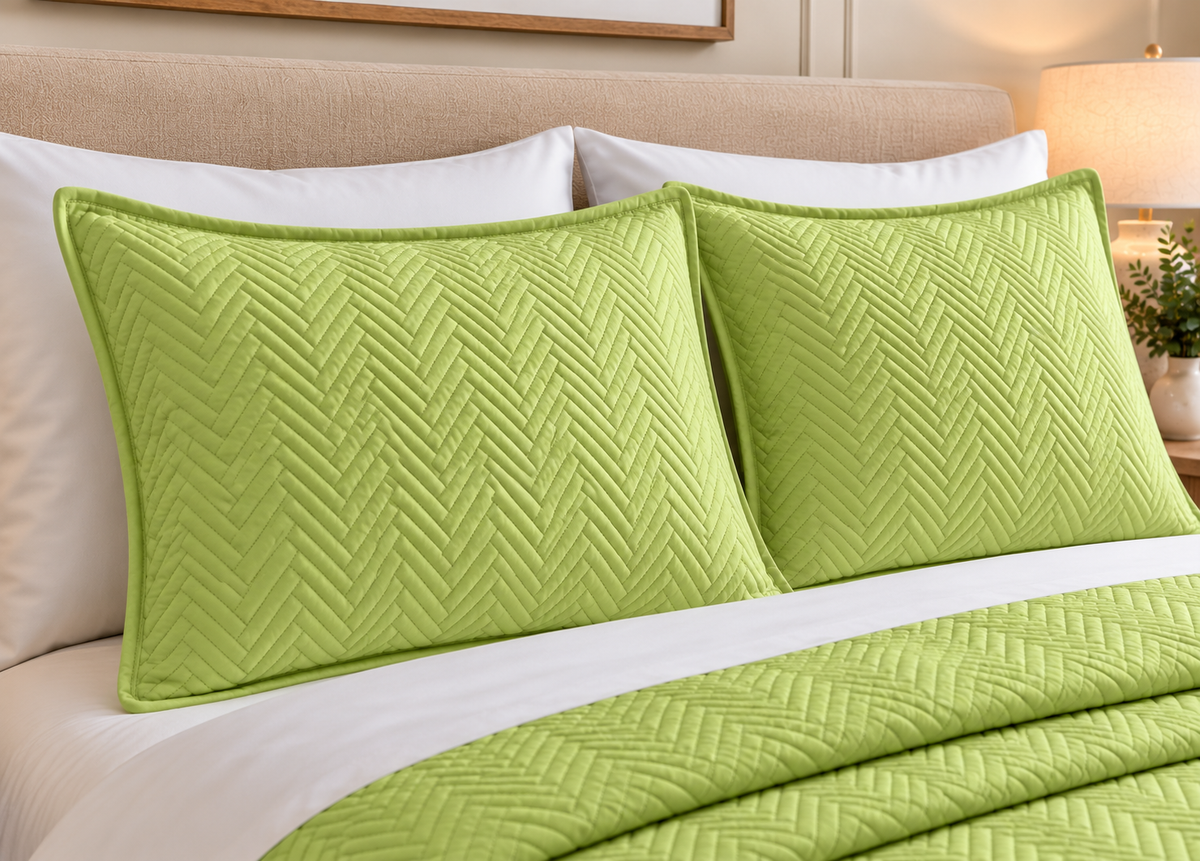 CLOSE UP PILLOW OF COTTON QUILTED HERRINGBONE BEDSPREAD SET - LIME