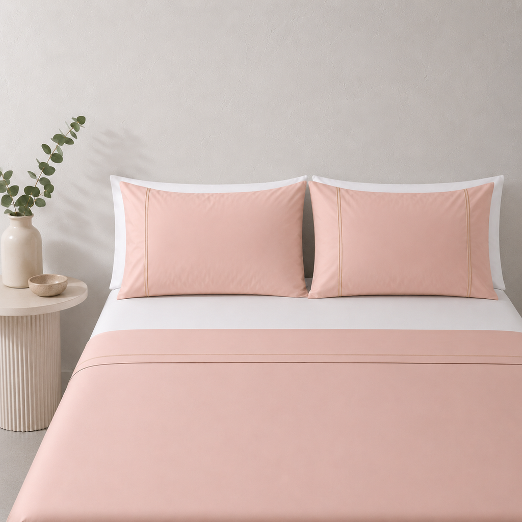 Peach Parfait 250TC GOTS certified organic cotton sheet set. Styled with white organic GOTS certified cotton fitted sheet. 
