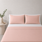 Peach Parfait 250TC GOTS certified organic cotton sheet set. Styled with white organic GOTS certified cotton fitted sheet. 