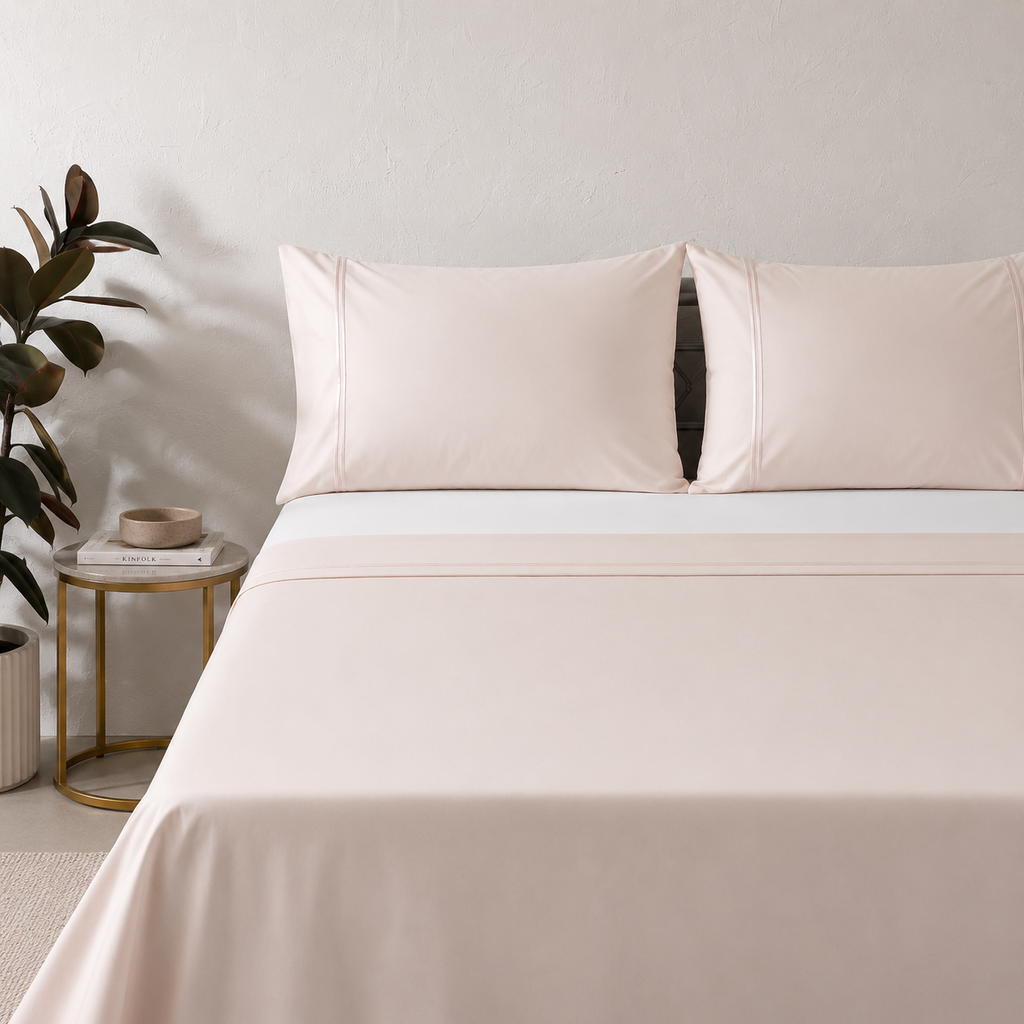 Whites of London 250TC GOTS certified Organic Cotton Coloured Sheet Set Peach Mist– with embroidered trim luxury bed linen NZ styled with 250TC GOTS certified organic cotton fitted sheet
