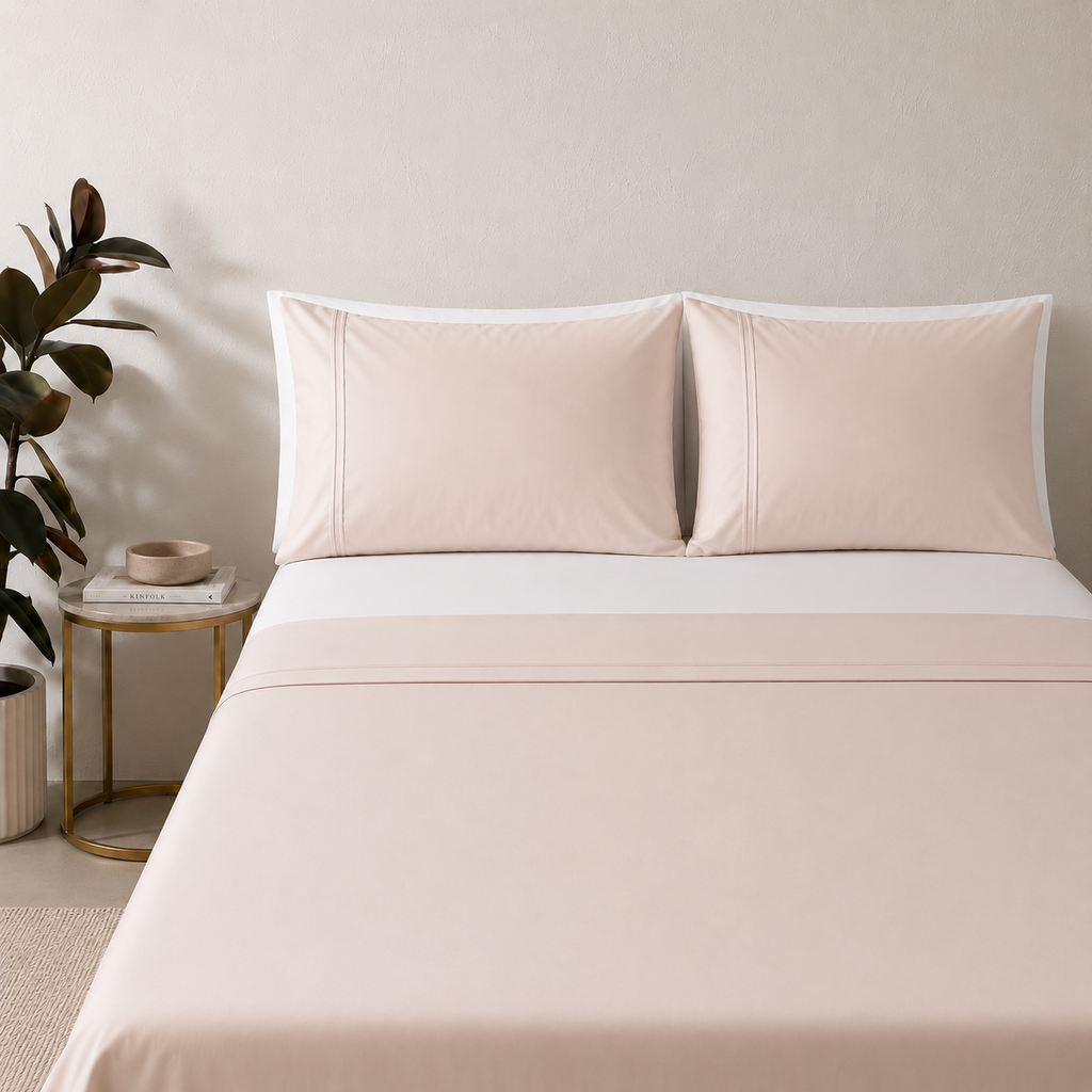 Peach mist 250TC GOTS certified organic cotton sheet set. Styled with white organic GOTS certified cotton fitted sheet. 