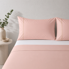 Whites of London 250TC GOTS certified Organic Cotton Coloured Sheet Set Peach parfait – with embroidered trim luxury bed linen NZ styled with 250TC GOTS certified organic cotton fitted sheet