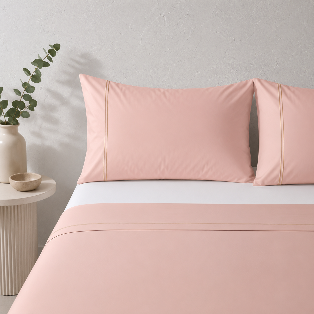 Whites of London 250TC GOTS certified Organic Cotton Coloured Sheet Set Peach parfait – with embroidered trim luxury bed linen NZ styled with 250TC GOTS certified organic cotton fitted sheet