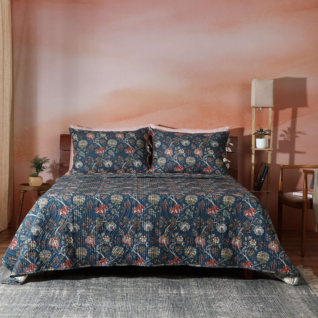 Percale Reversible Quilt set chintz percale  front view on styled bed teal and cream jacobean floral Whites of London