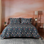 Percale Reversible Quilt set chintz percale  front view on styled bed teal and cream jacobean floral Whites of London