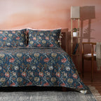 Percale Reversible Quilt set chintz percale  right-angle view on styled bed teal and cream jacobean floral Whites of London 