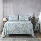 Zoomed-out full bed shot showcasing Windflower 250TC GOTS certified organic cotton percale printed sheet set in blue and sage tones