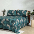 Full bed side angle lifestyle shot: Hydrangea GOTS certified organic cotton percale printed sheet set percale printed sheet set deep teal botanical floral Whites of London