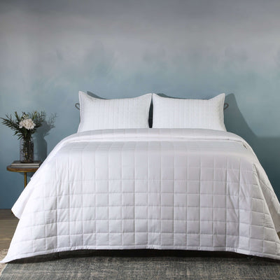 Full bed front on with white quilted bedspread and side table: White bamboo cotton bedspread set quilted square pattern full bed Whites of London NZ