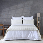 Ivory bedspread layered over white duvet full bed front on: Ivory bamboo cotton bedspread set layered over white duvet cover styled bedroom Whites of London