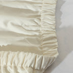 Elastic of the Ivory Organic Cotton Fitted Sheet. Whties of London.
