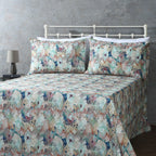 GOTS Certified Organic cotton percale printed sheet set featuring a floral pattern in terracotta and teal.