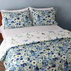 showcasing gardenia pillowcases and the reverse side duvet cover of the Whites of London NZ REVERSIBLE PRINTED DUVET COVER SET - GARDENIA 250TC 