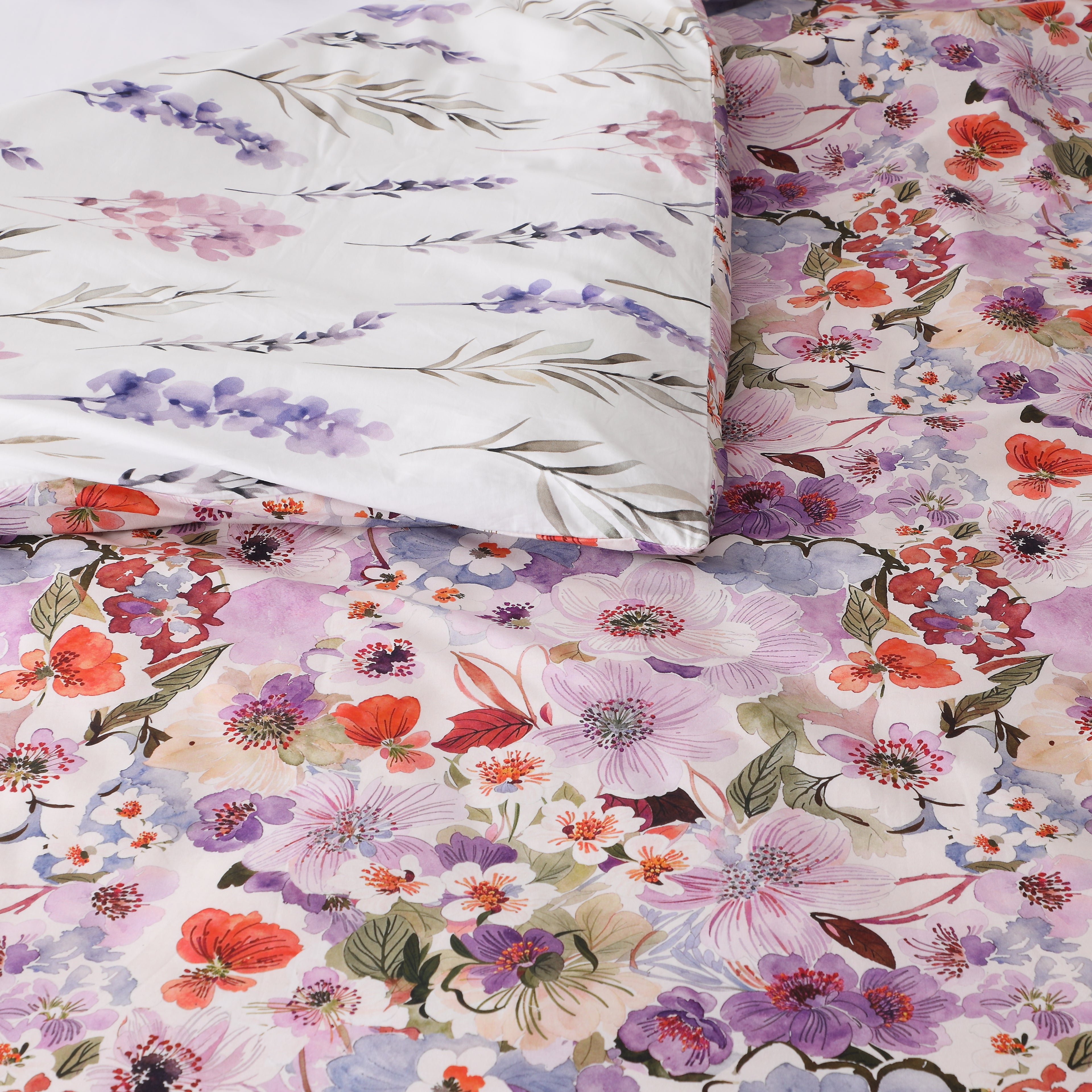 another close up showcasing both sides Whites of London NZ REVERSIBLE PRINTED DUVET COVER SET - FLUTTER 250TC
