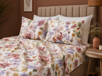 Side view showing matching pillowcases of the of Whites of London NZ Serenity GOTS certified Organic Cotton Percale Printed Sheet Set 250TC 
