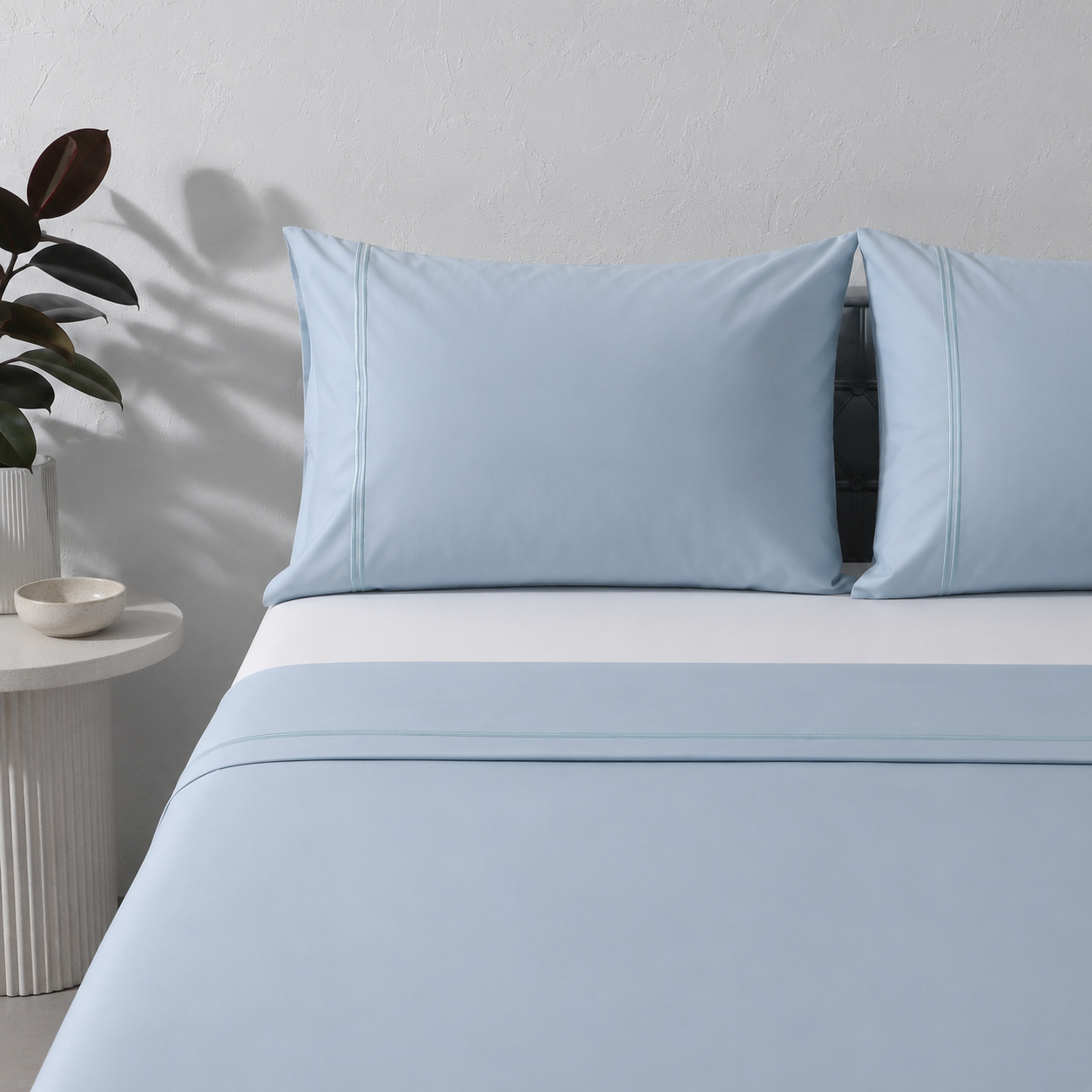 Whites of London 250TC GOTS certified Organic Cotton Coloured Sheet Set Sky – white embroidered trim luxury bed linen NZ styled with 250TC GOTS certified organic cotton fitted sheet