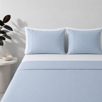 Sky 250TC GOTS certified organic cotton sheet set by Whites of London NZ. Styled with white organic GOTS certified cotton white fitted sheet and pillow cases