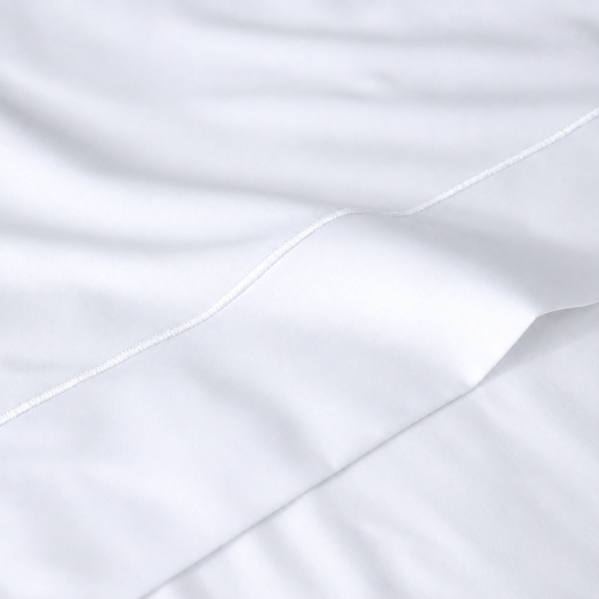 extreme close up of the embroidery - BAMBOO COTTON EMBROIDERED SHEET SET - 375TC WHITE